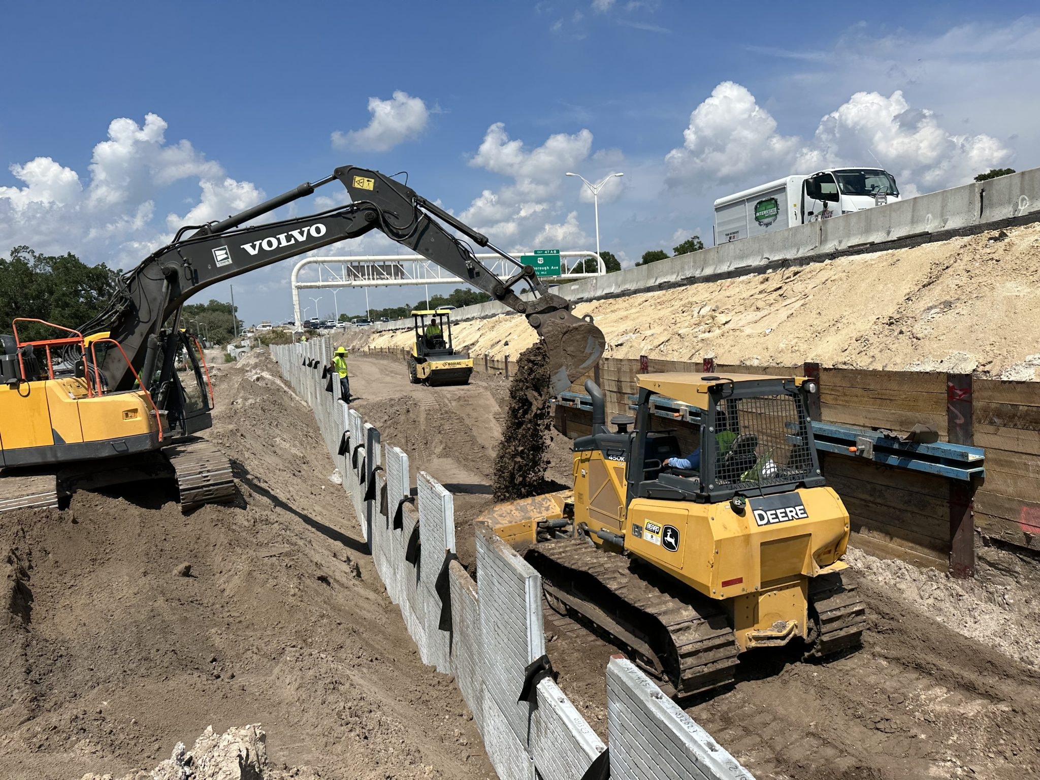MSE panel wall construction with heavy equipment on I-275